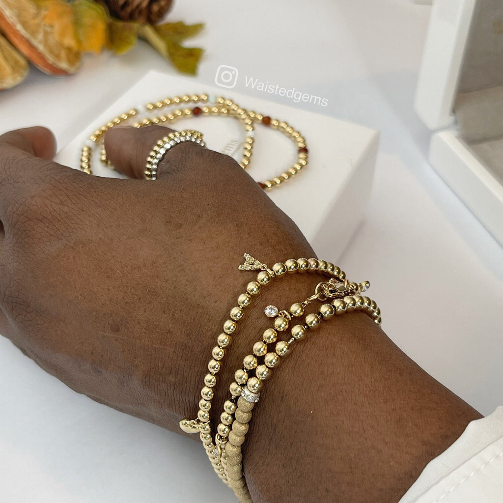 14K Gold Beaded Bracelet Initial Charm worn